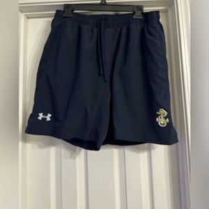 Under Armour U.S. Navy shorts are a size XL.